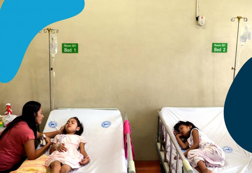 A mother looks after her daughter in hospital