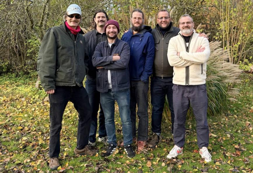 Group shot photo of Efterklang and Flow Creative with the World Mosquito Program